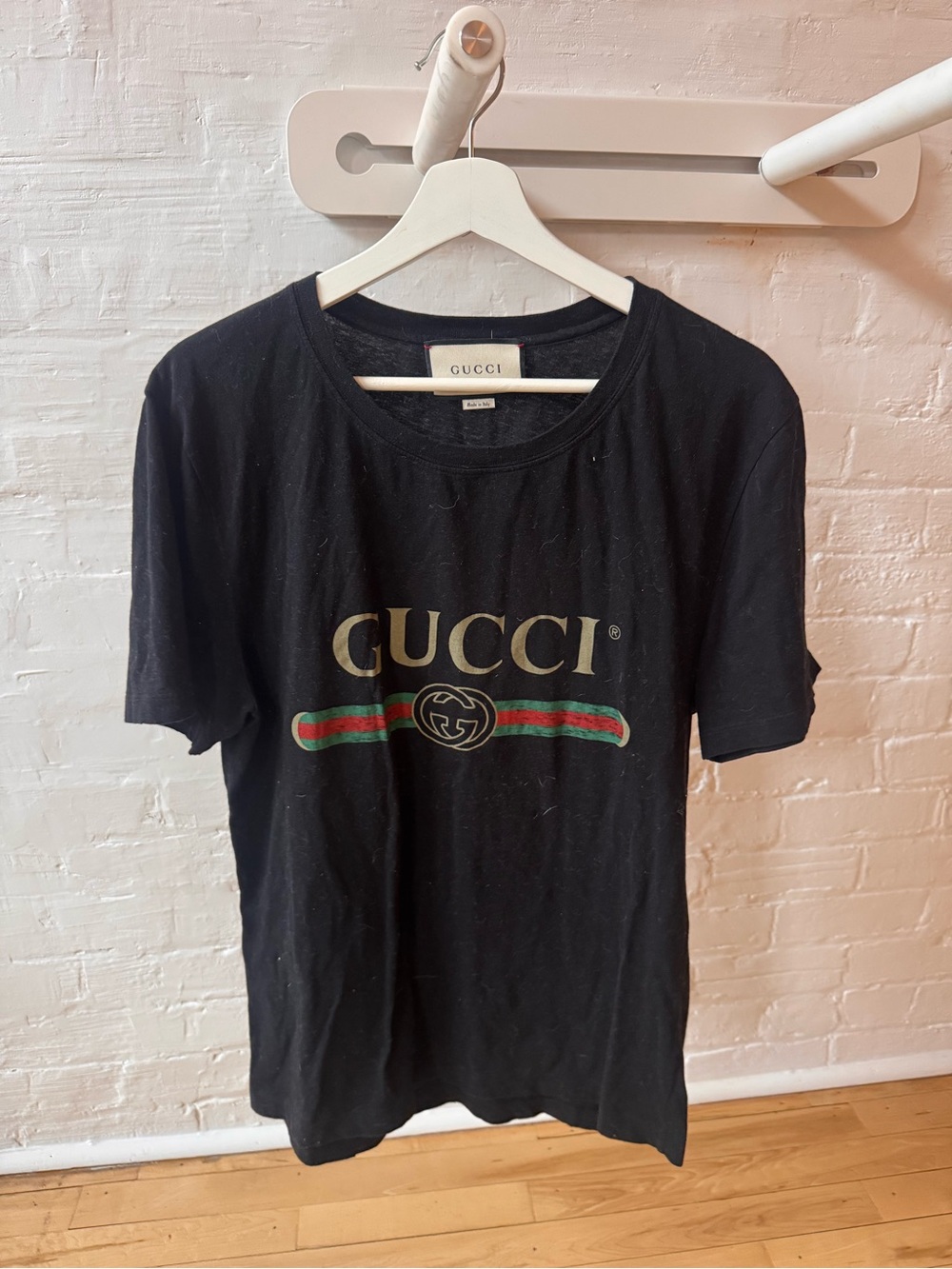 Gucci Black Tee with Gold Logo and Red-Green Stripe